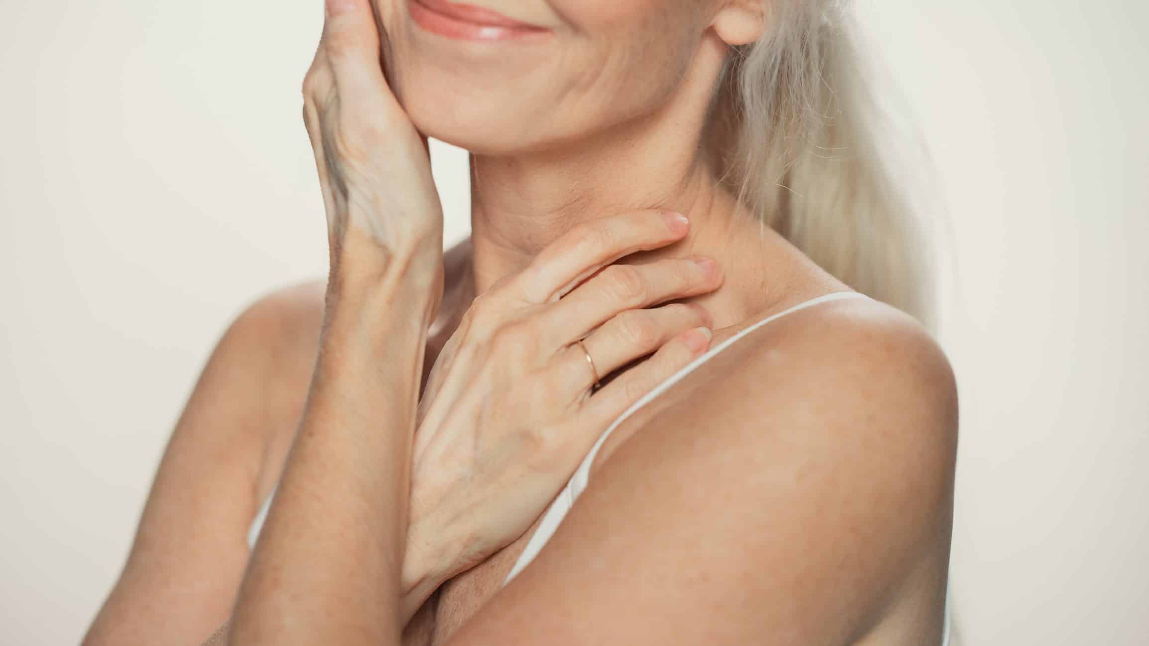 Anonymous Senior Woman Touching